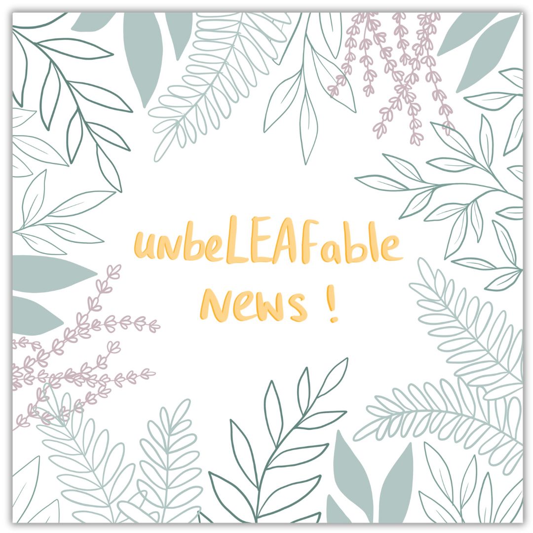 A botanical celebration greeting card that says "unbeLEAFable news!" in the centre. The words are in yellow gold. All around the words are leaves, petals and floral elements all in various shades of green with a little touch of dusky pink on some lavender.