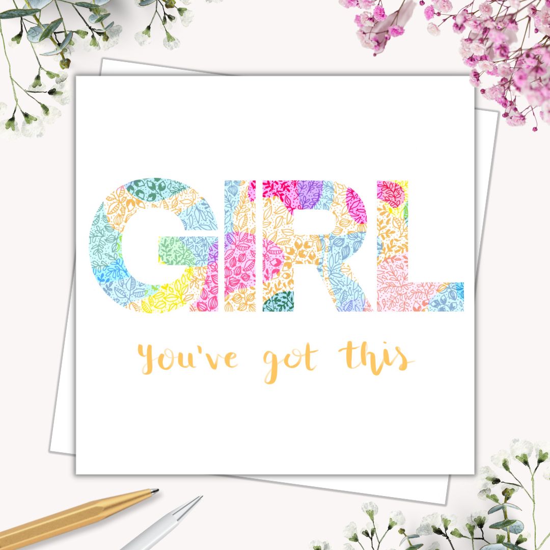 Image shows card with the phrase GIRL YOU GOT THIS. drawn in the centre middle of the illustration. image is multi coloured. Image is laid on cream surface with a pencil at the bottom left hand side of the page and flowers surrounding each side. 